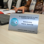 Wyróżnienie w formie grawerowanej plakietki przyznane Białostockiej Radzie Seniorów .